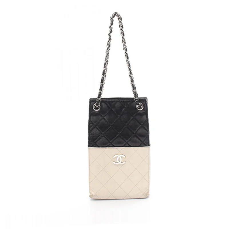 Chanel Designer Handbag with Unique DesignBlack Chanel Bicolor Quilted Lambskin Vertical Shopping Tote