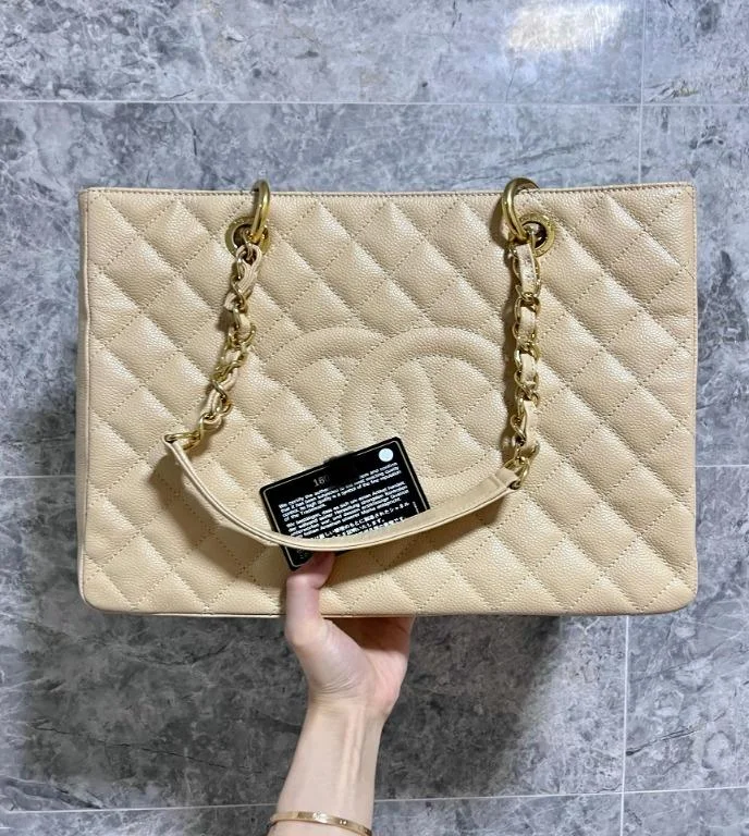 Chanel Handbag with Adjustable Strap for ComfortBeige Grand Shopping Tote GST with Gold Hardware Caviar