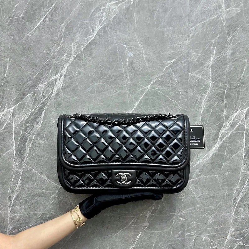 Chanel Designer Handbag with Unique Design*Like New* Twist Timeless Jumbo Patent with Lambskin Black No 18